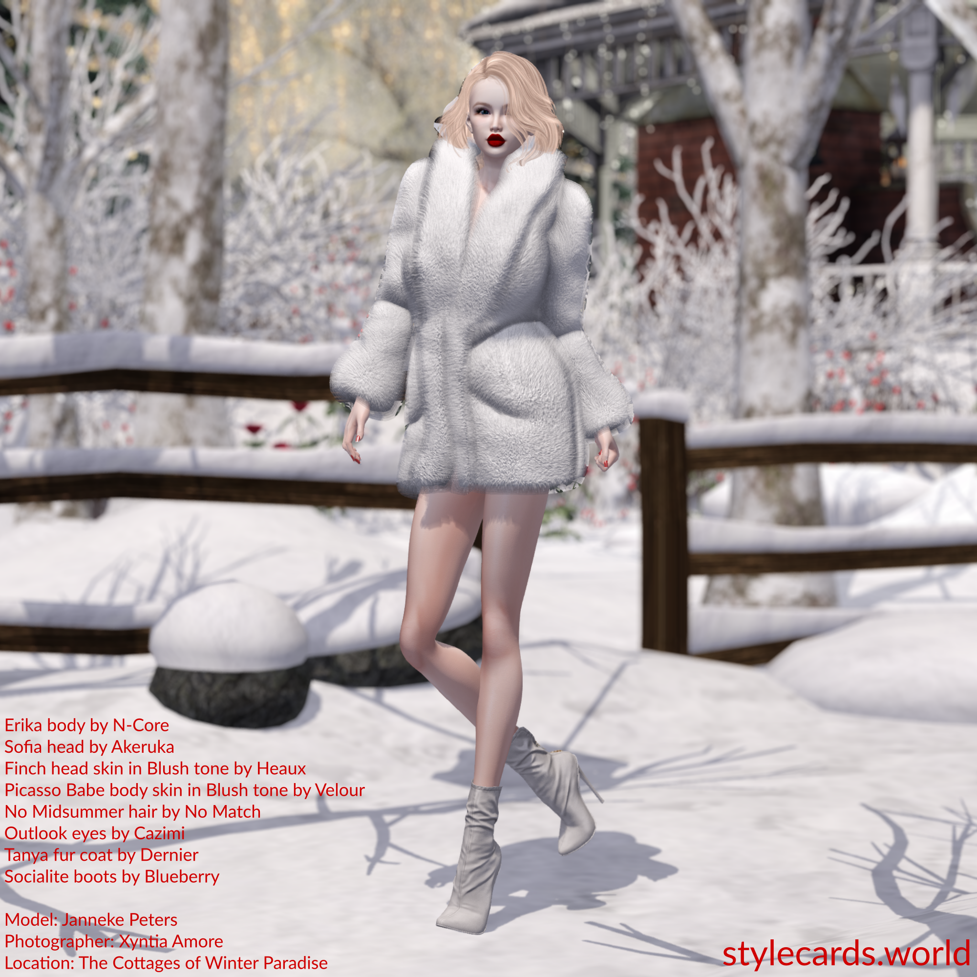 Janneke Peters is wearing a white fur coat and white boots, but most of her legs are bare. She is walking in a snowy area during daytime. In the background are cottages, trees, and fences that are all partially covered by snow.