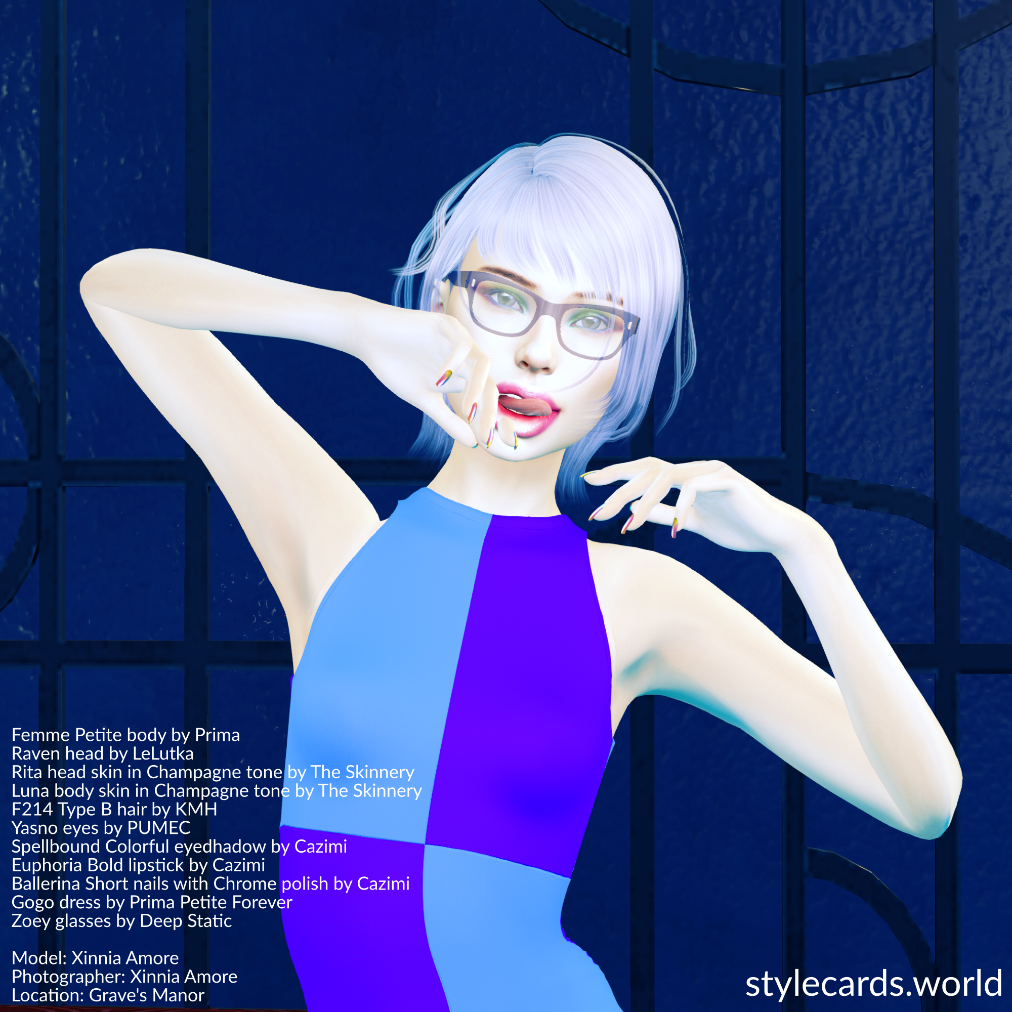 A photo showing Xinnia Amore from the waist up as she strikes a pose for the camera. She is standing in front a blue stained glass panel while wearing a two-tone sleeveless dress, blue-framed eyeglasses, and white-and-blue ombre hair. Her eyeshadow, lipstick, and fingernails are from Cazimi.