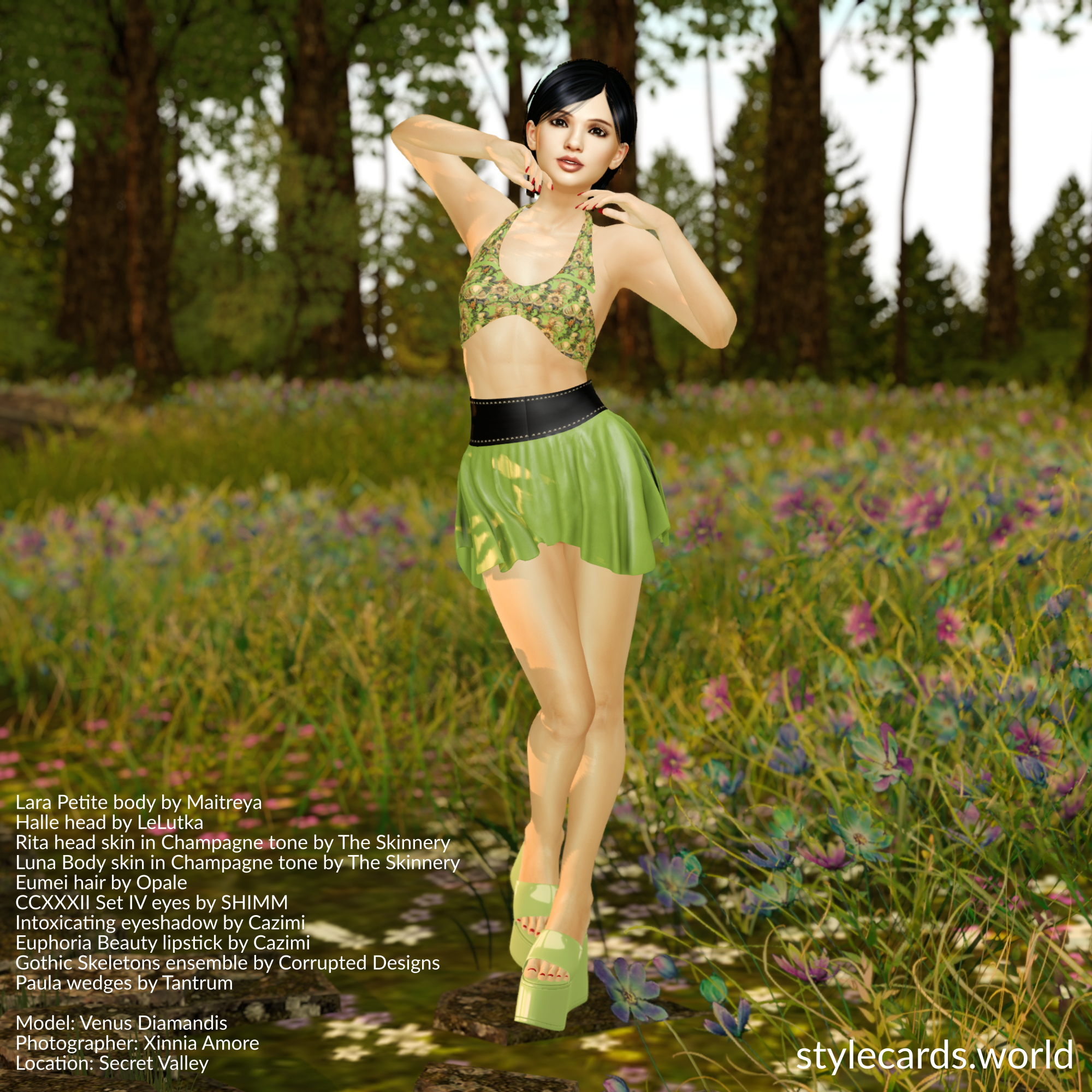 Venus Diamandis is posing in a field of wild flowers while wearing a floral-patterned halter top and a matching green miniskirt in a Corrupted Designs ensemble and chunky-soled green sandals from Tantrum.