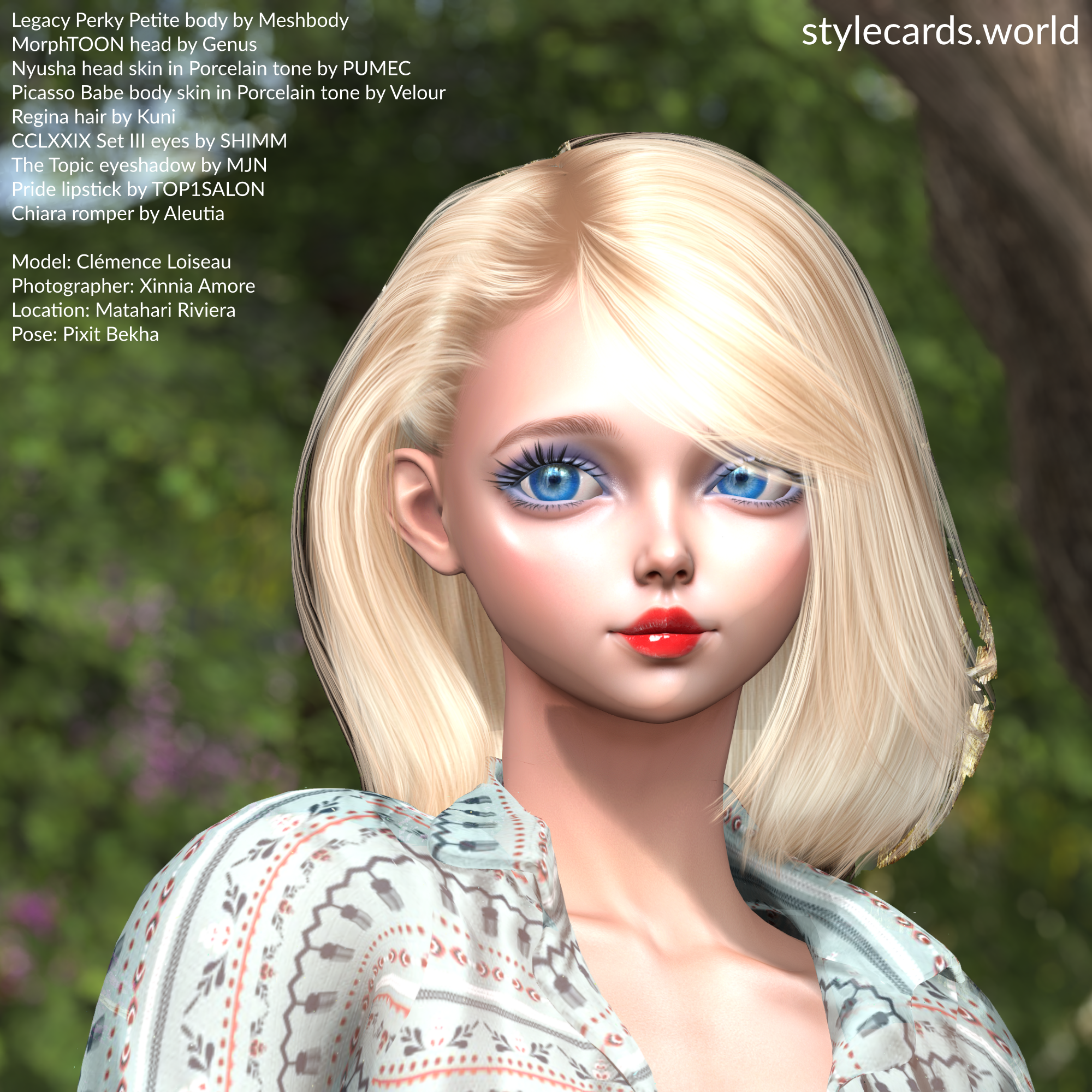 A headshot of Clémence Loiseau. She has short blonde hair, blue eyeshadow, red lipstick, is wearing a patterned top. In the background are some trees that have been blurred by depth-of-field.